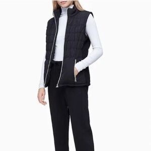 Calvin Klein Women's Full Zip Quilted Puffer Vest.
Matte Black